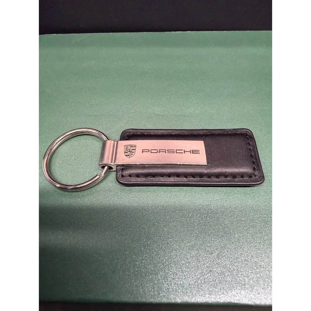 Porsche Black Leather Keychain Braman Motorcars Roadside Assistance Metal Crest
